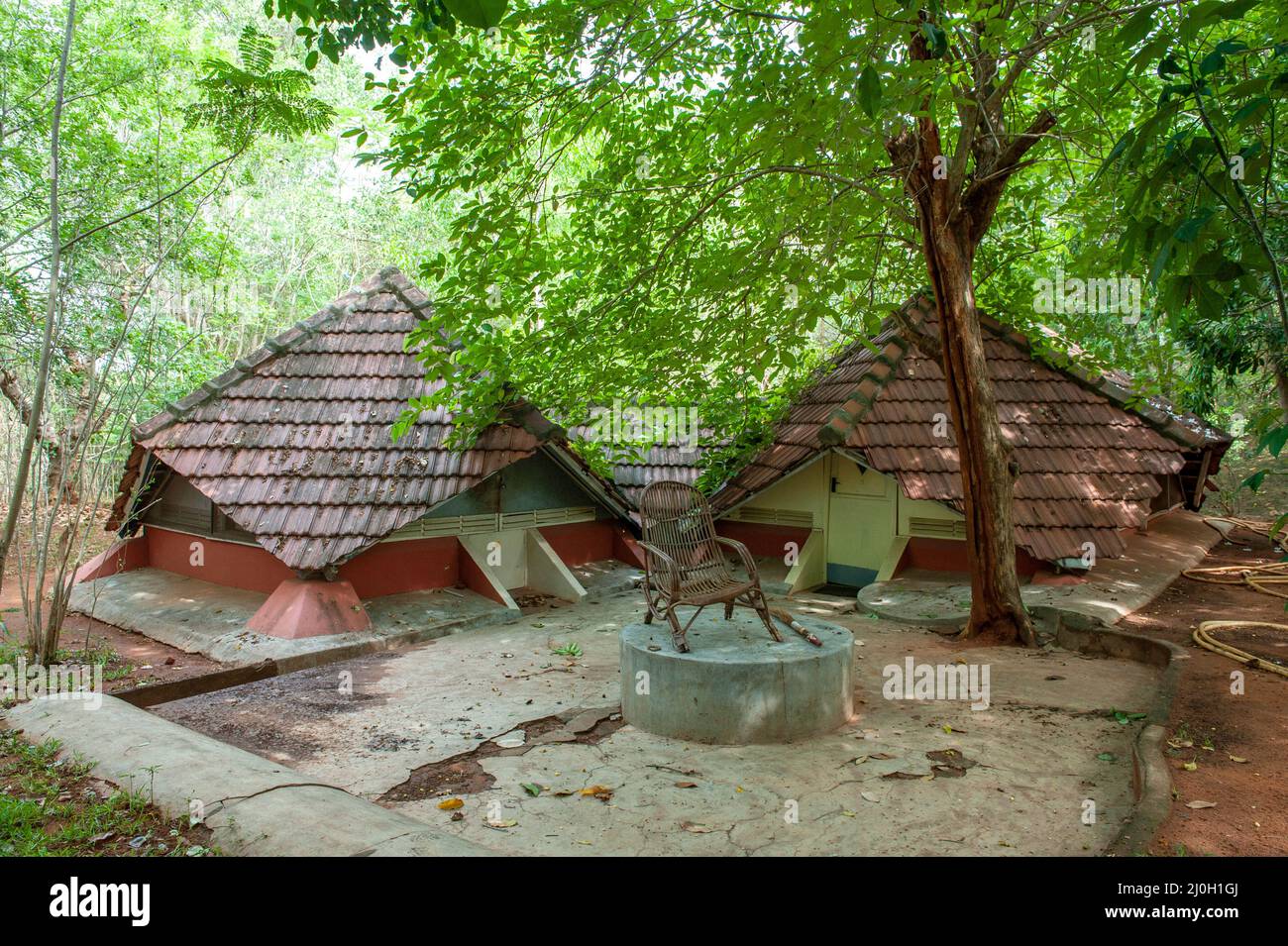 Auroville, India - July 2019: Aspiration Community. Two houses built in the sixties by the first people who came to build Auroville. Stock Photo