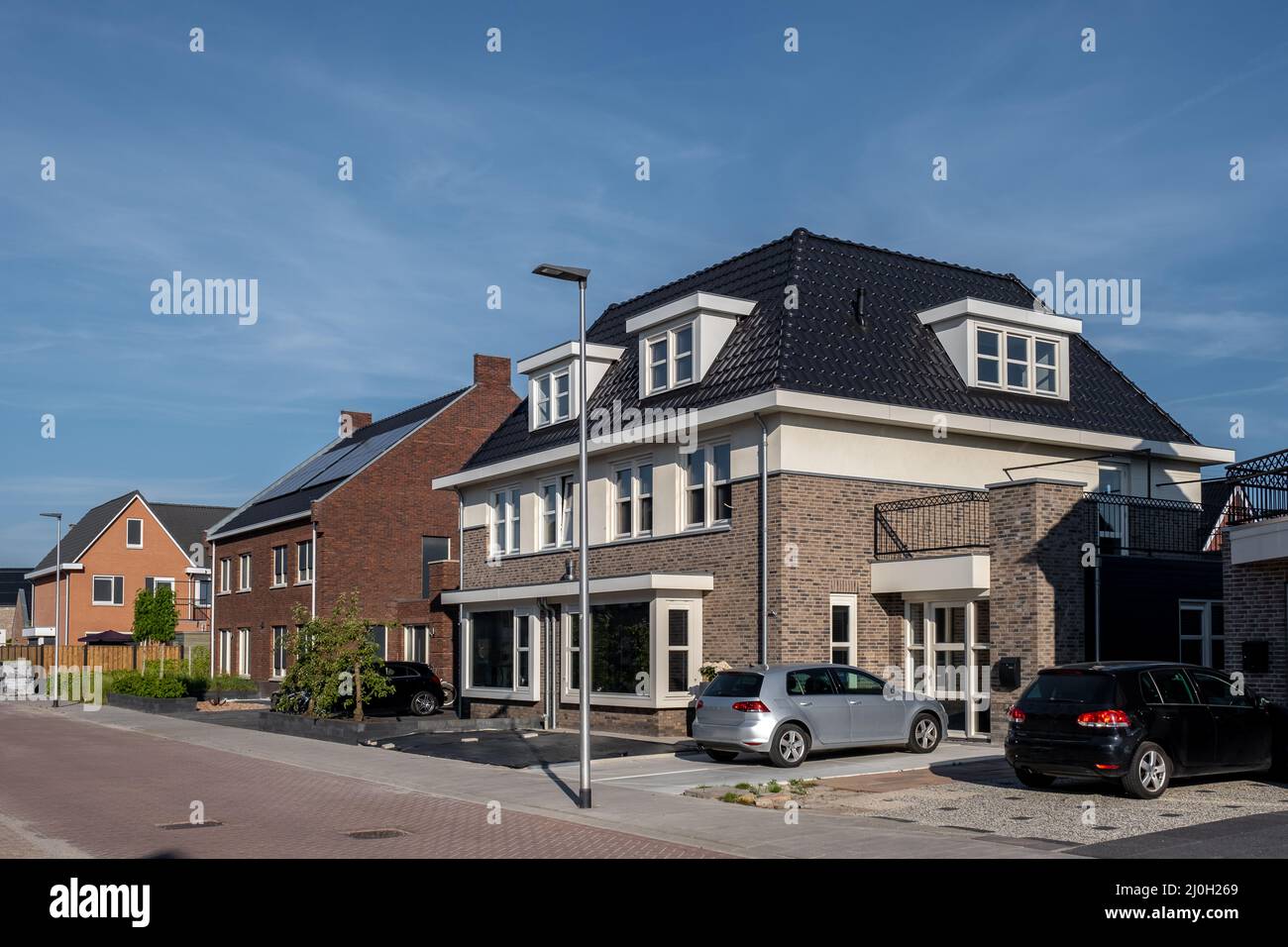 Dutch Suburban area with modern family houses,newly build modern family homes in the Netherlands,dutch family house, appartment Stock Photo