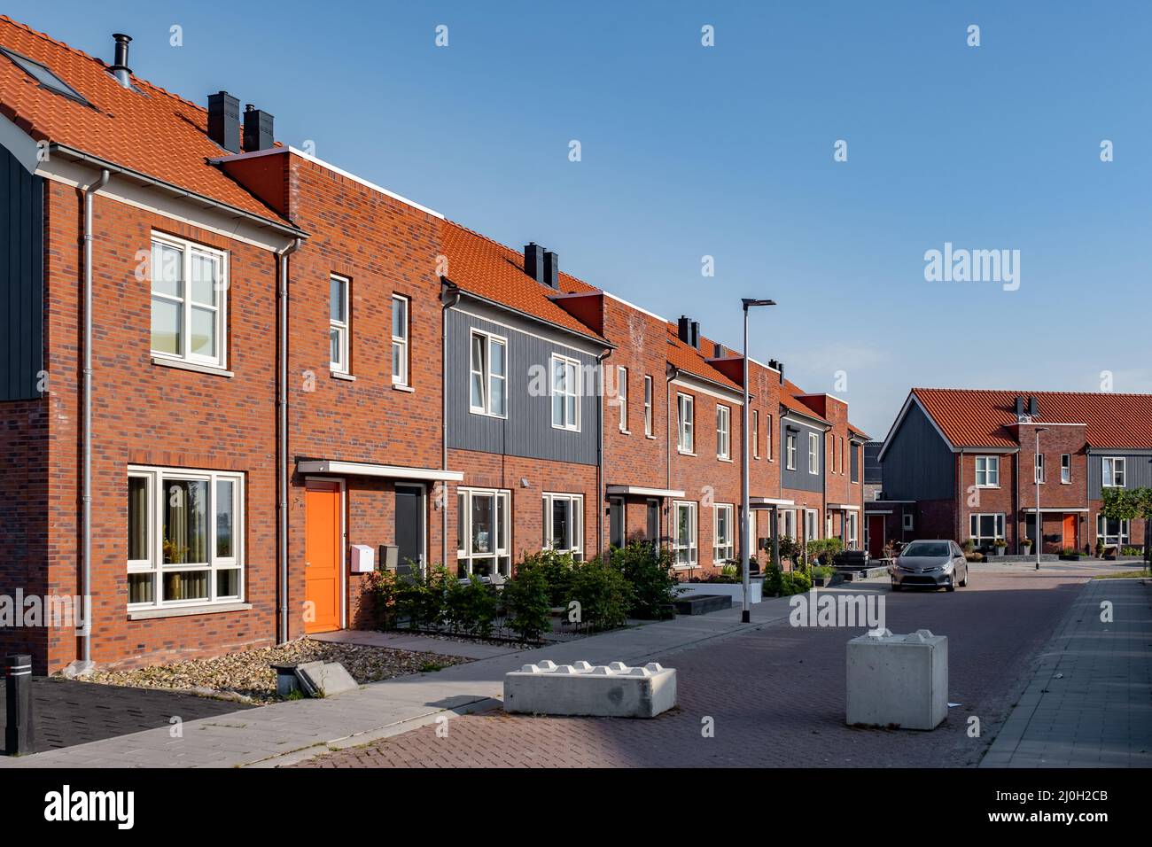 Dutch Suburban area with modern family houses,newly build modern family homes in the Netherlands,dutch family house, appartment Stock Photo