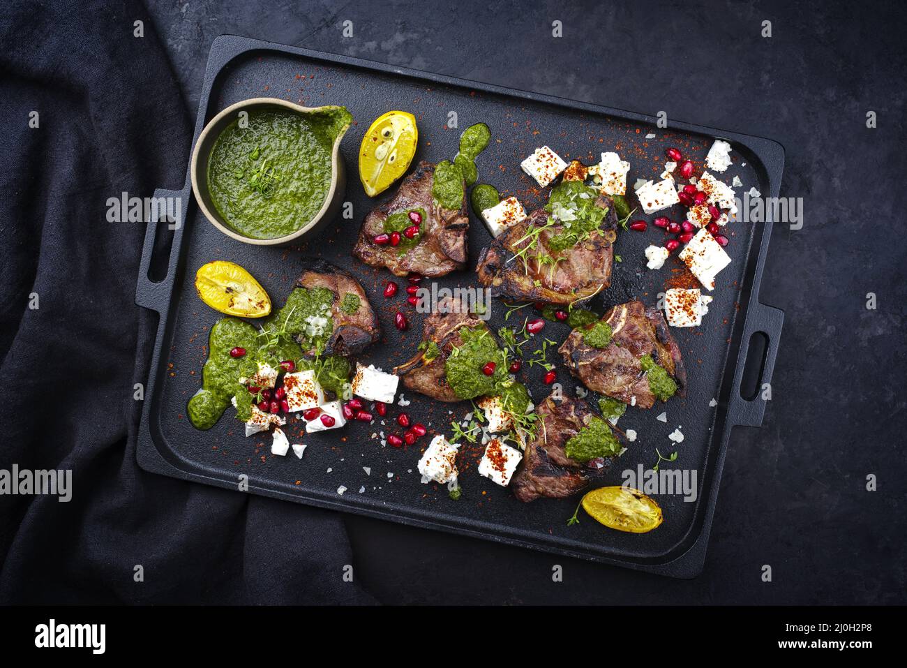 Traditional barbecue T-Bone lamb steaks with Greek feta cheese Stock