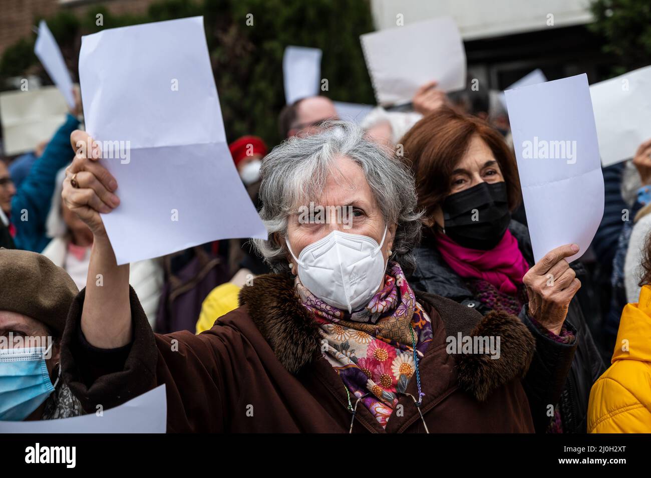 Madrid, Spain. 19th Mar, 2022. People carrying white papers are seen during a protest in front of the Russian embassy. People gathered to protest against the Russian invasion of Ukraine carrying white papers in support of the Russian citizens arrested for protesting in their country against the war in Ukraine. Credit: Marcos del Mazo/Alamy Live News Stock Photo