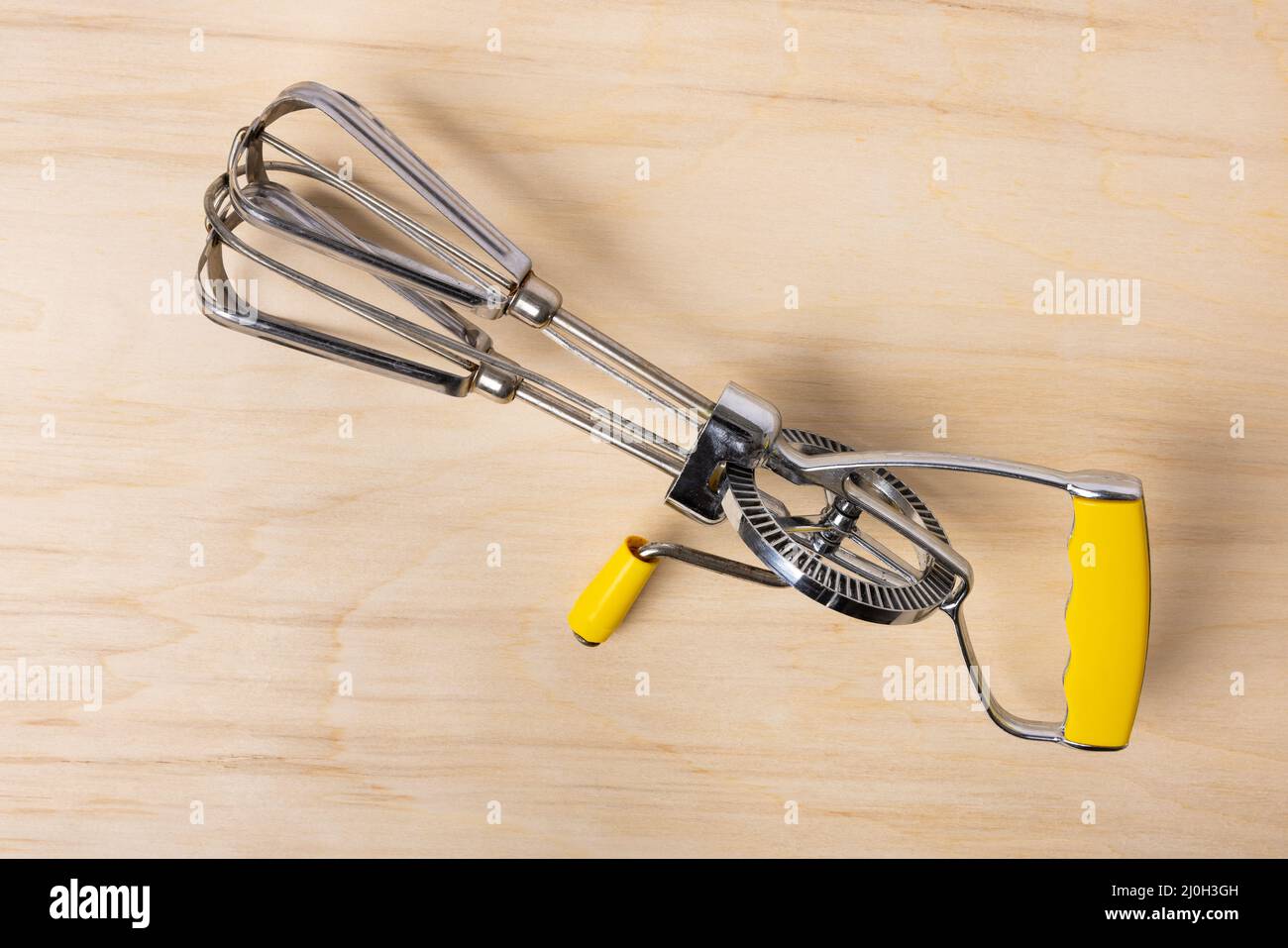 Pair of manual hand egg beater mixer Stock Photo - Alamy