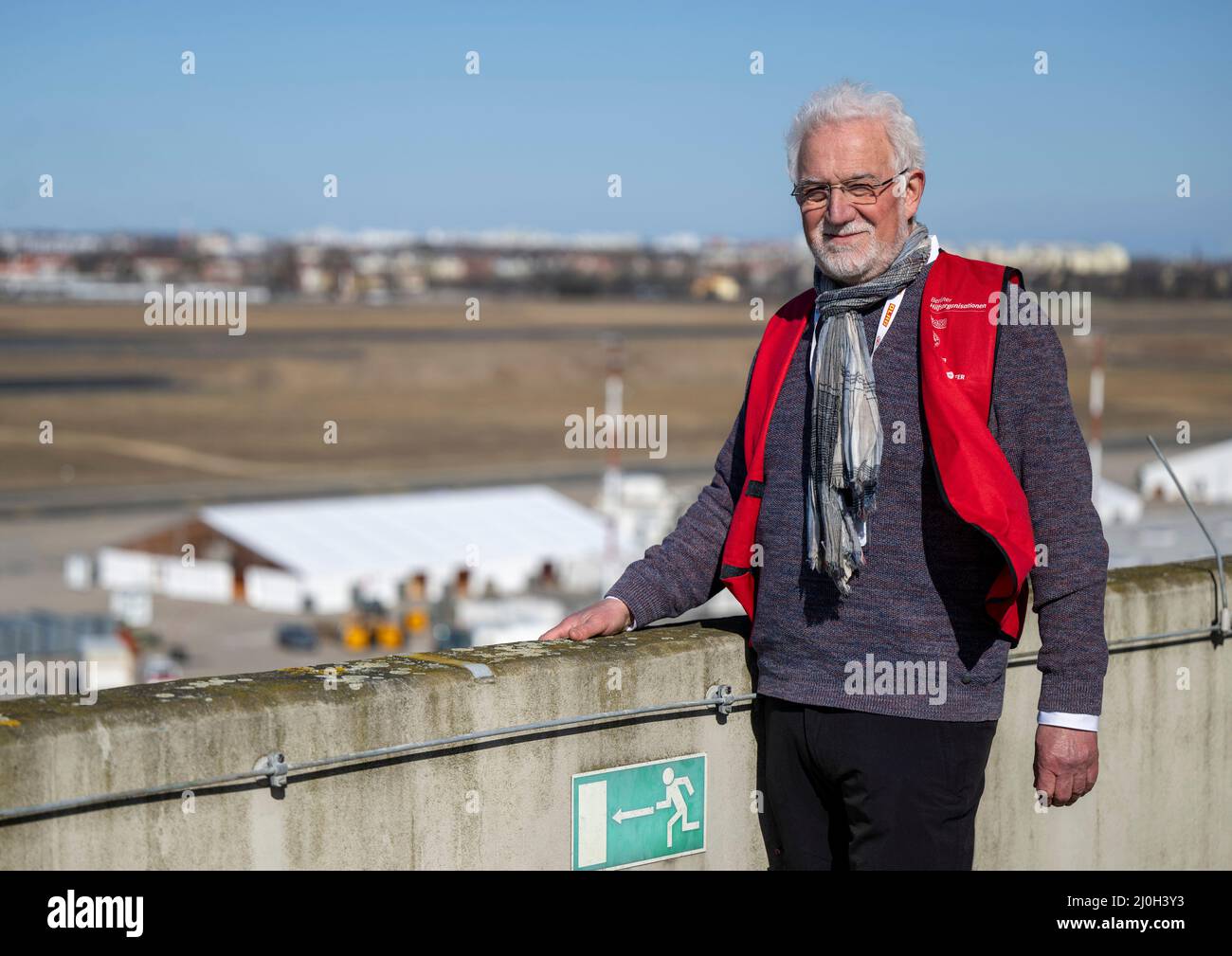 Tegel, Germany. 18th Mar, 2022. 18 March 2022, Berlín: Project manager Detlef Cwojdzinski from the terrace of the former main terminal of Berlin-Tegel Airport, now converted into a center for receiving Ukrainian refugees. Photo: Monika Skolimowska/dpa-Zentralbild/dpa Credit: dpa picture alliance/Alamy Live News Stock Photo
