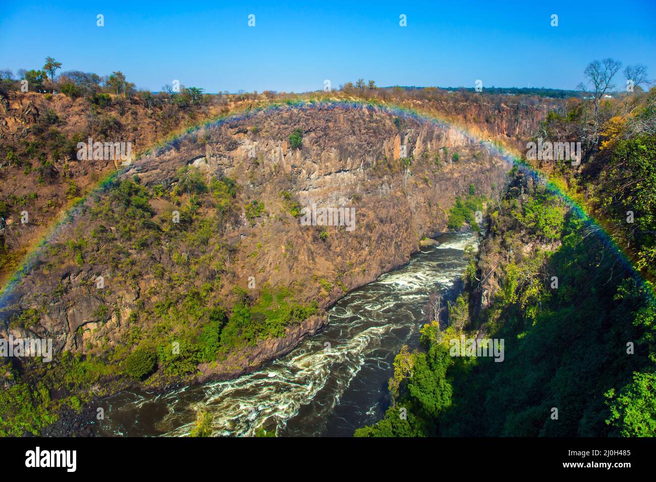 Beautiful rainbow over the river Zambezi Stock Photo