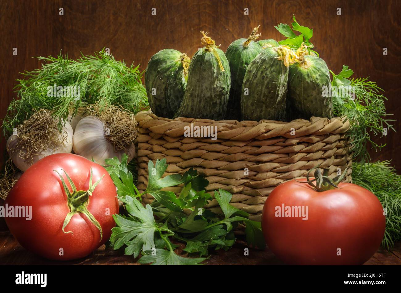 Fresh vegetables on a dark wooden background in a rustic style Stock ...