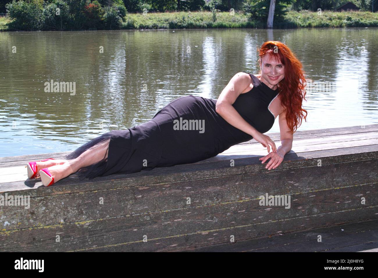 Woman in dress on river hi-res stock photography and images - Alamy