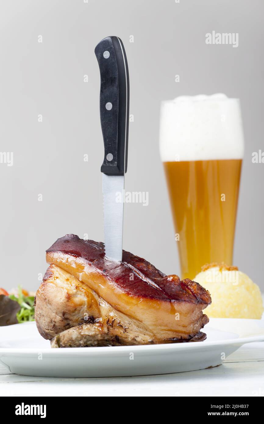 SchÃ¤ufele with knife Stock Photo