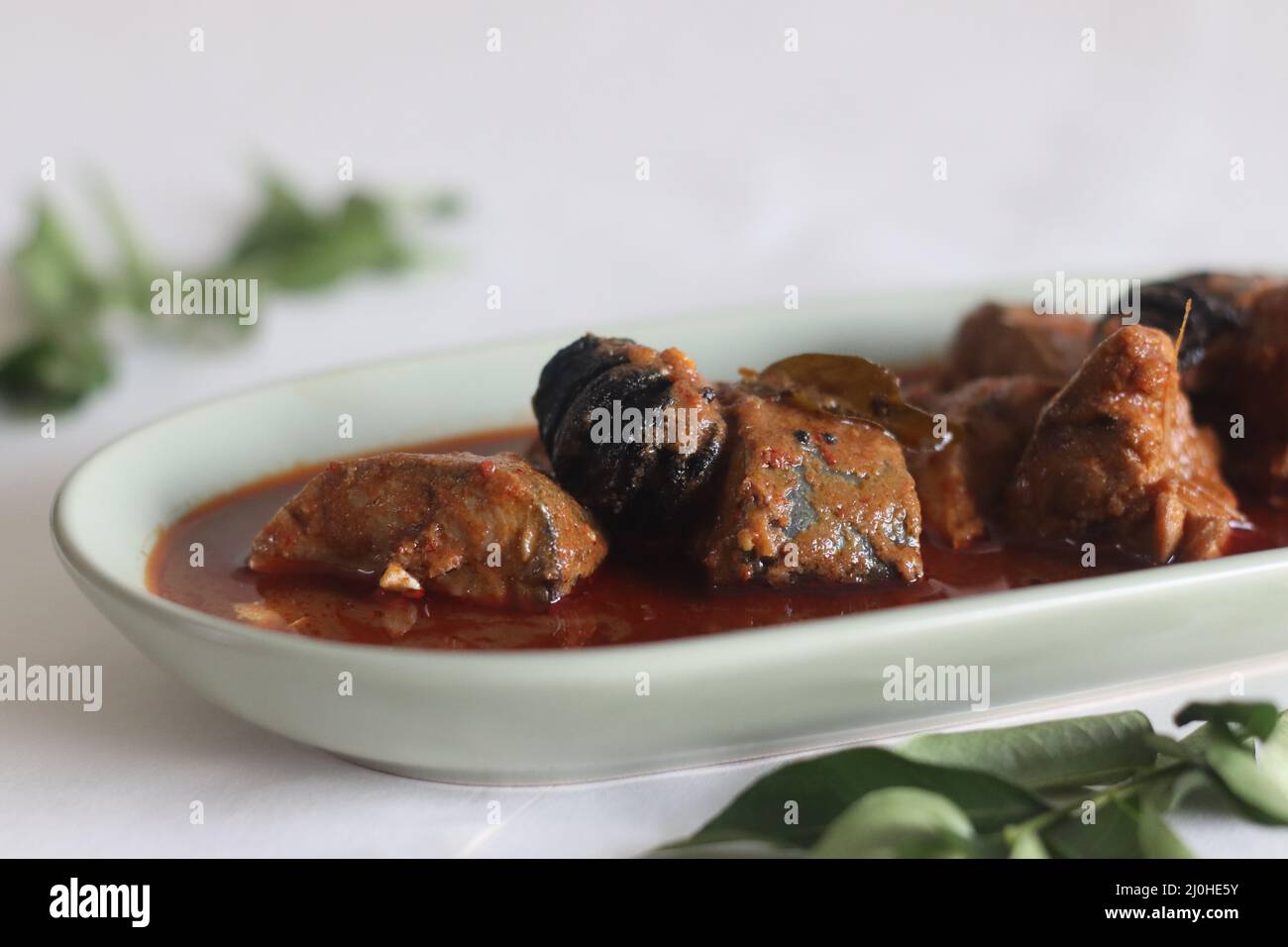 Mackerel curry prepared in central Kerala style with red chilies and