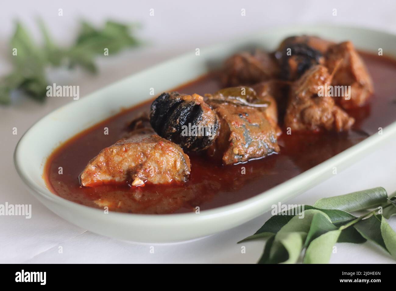 Mackerel curry prepared in central Kerala style with red chilies and