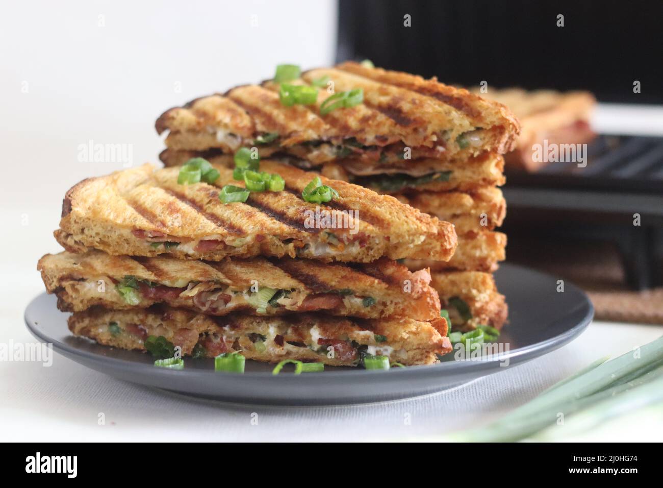 Cream cheese bacon sandwiches. Grilled sandwiches with a spread made of combination of cream