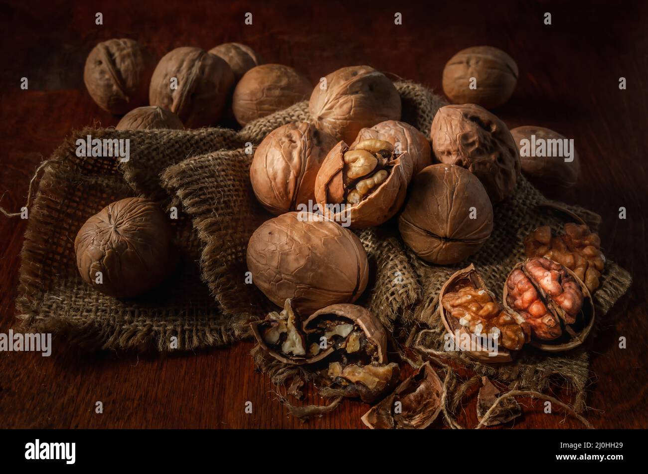 Walnuts on a dark background in a rustic style Stock Photo