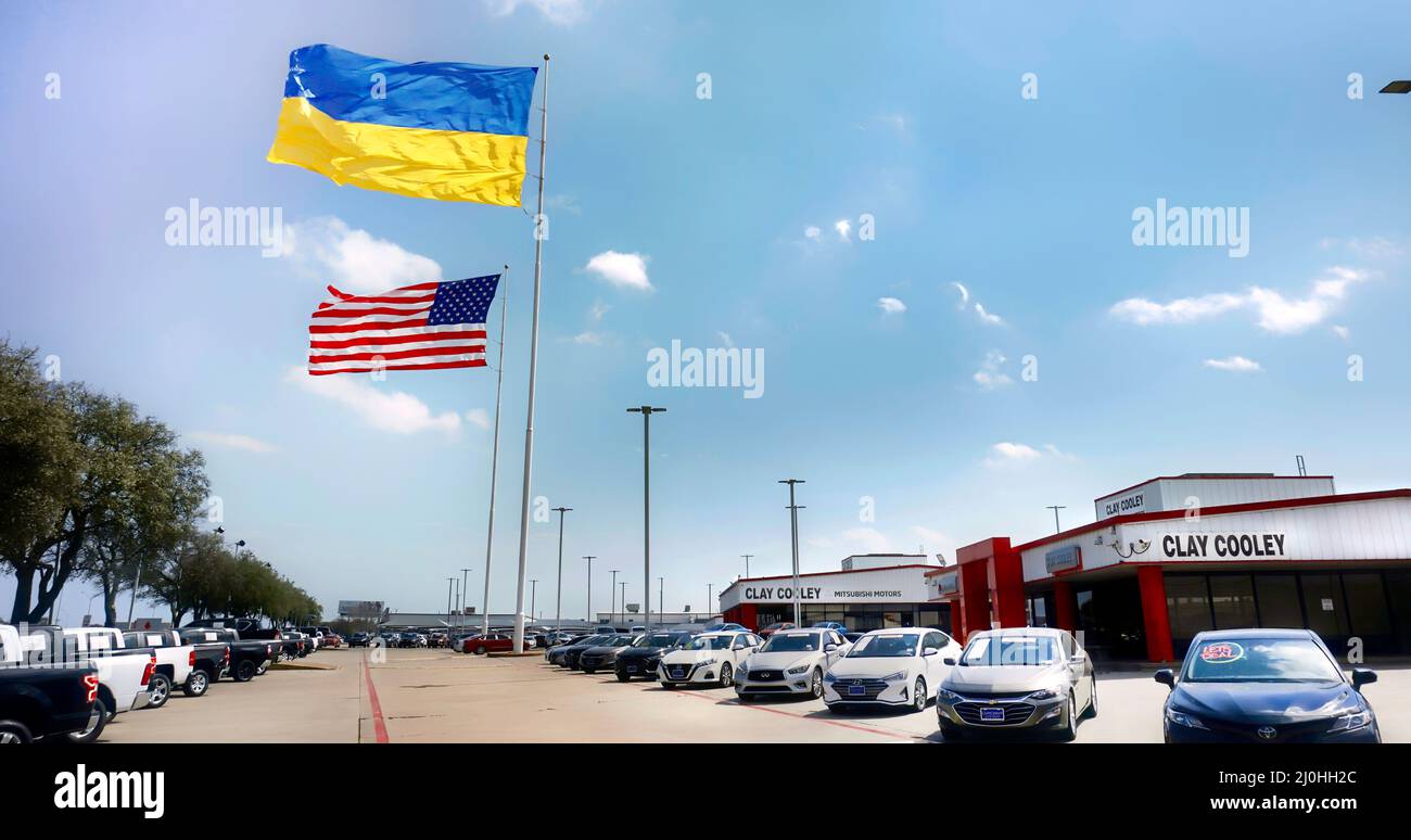 Arlington,Texas- March 17,2022  Today I  went by Clay Cooley Auto Group on Interstate 20 in Arlington Texas.They had two very large American and Ukrai Stock Photo