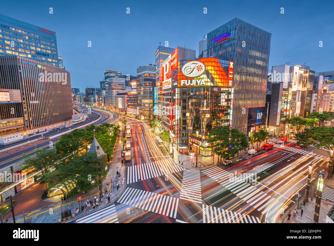 TOKYO, JAPAN - MAY 9, 2017: The Ginza district at night. Ginza is a popular upscale shopping area of Tokyo. Stock Photo