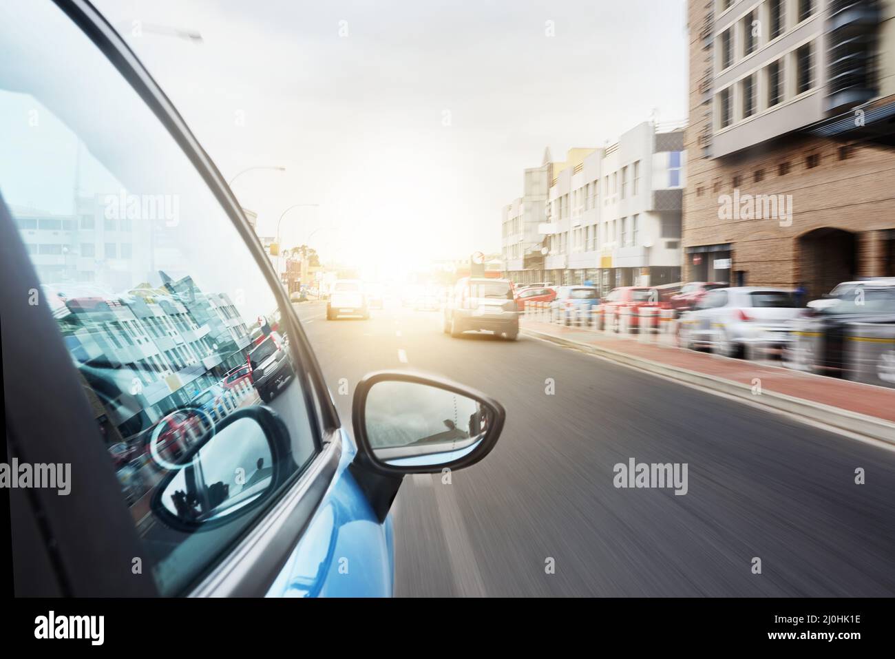 Always on the move. Shot of a car driving on a road. Stock Photo