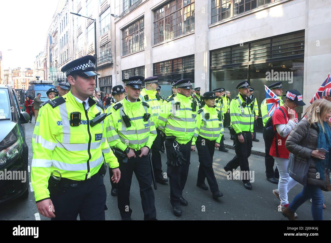 London.19th March 2022. Anti-vaxxers march through Soho. Credit: Brian minkoff/Alamy Live News Stock Photo