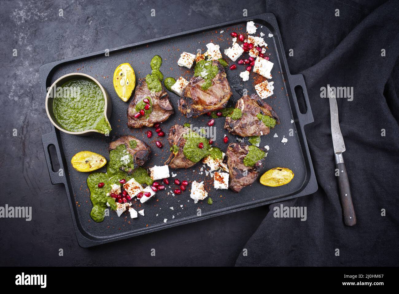 Traditional barbecue TBone lamb steaks with Greek feta cheese Stock