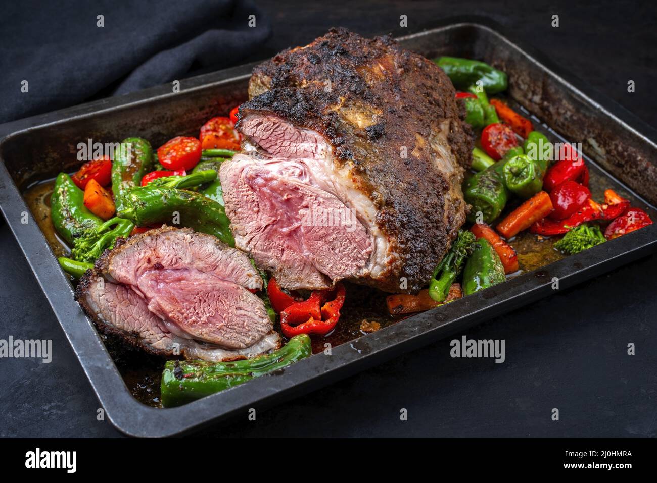 Traditional English barbecue lamb roast with vegetable and gravy sauce