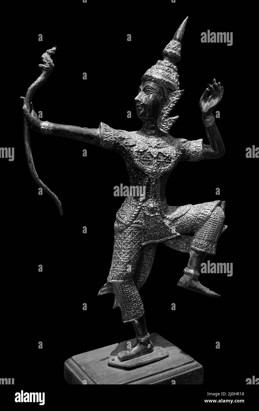 Prince Rama statue with a bow. Archer, Rama of Hinduism sculpture isolated on black background Stock Photo