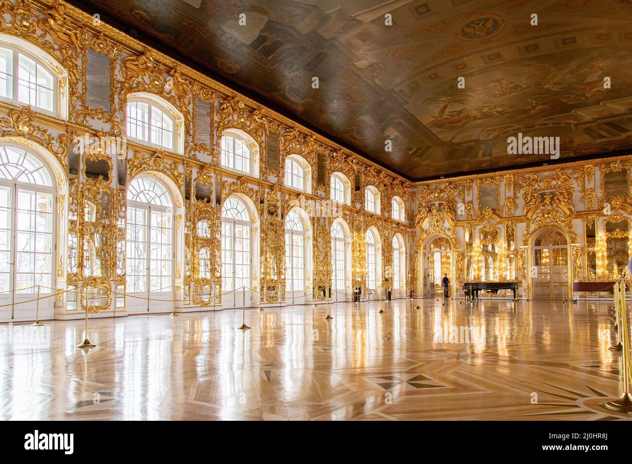 Tsarskoye Selo (Pushkin), Saint-Petersburg, Russia - March, 27, 2021: Rococo baroque golden interior of Catherine palace, locate Stock Photo