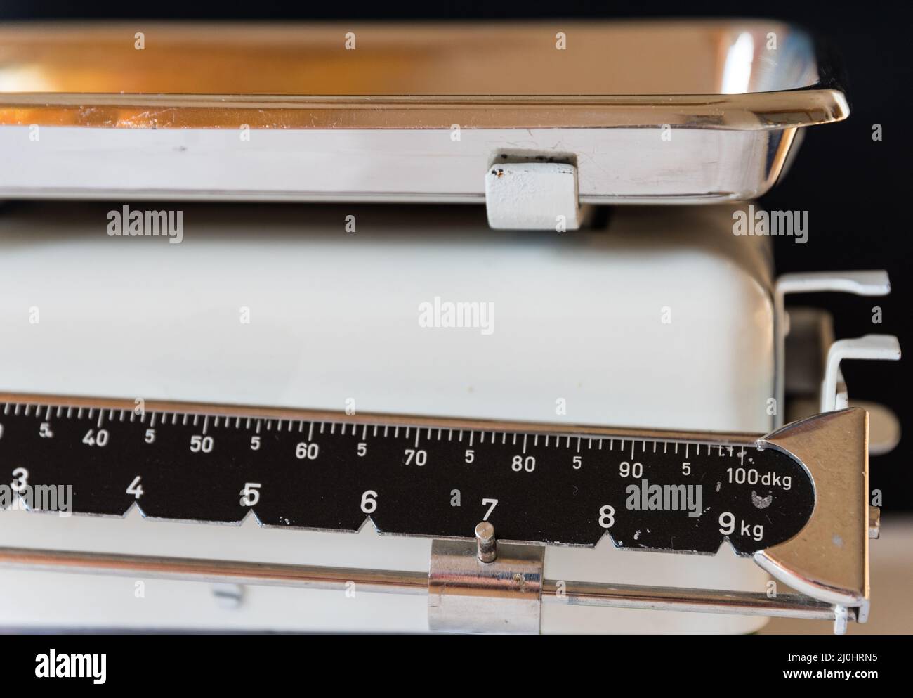Old kitchen scales with weighing pan detail Stock Photo Alamy