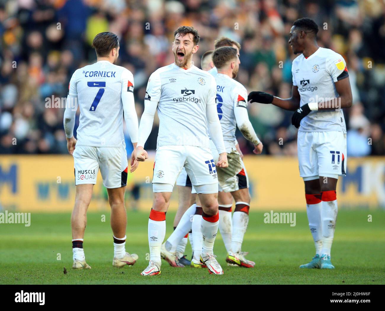 Luton Town's Tom Lockyer celebrates the third goal scored by James Bree during the Sky Bet Championship match at the MKM Stadium, Kingston upon Hull. Picture date: Saturday March 19, 2022. Stock Photo