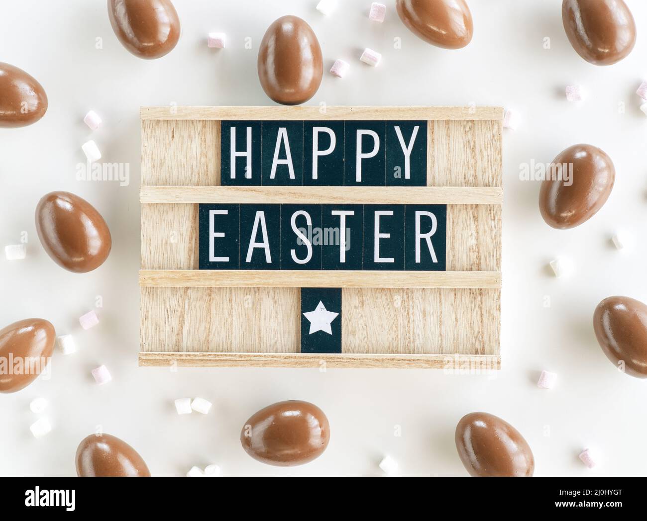 Easter holiday background. Chocolate eggs and sprinkle. Top view Stock ...