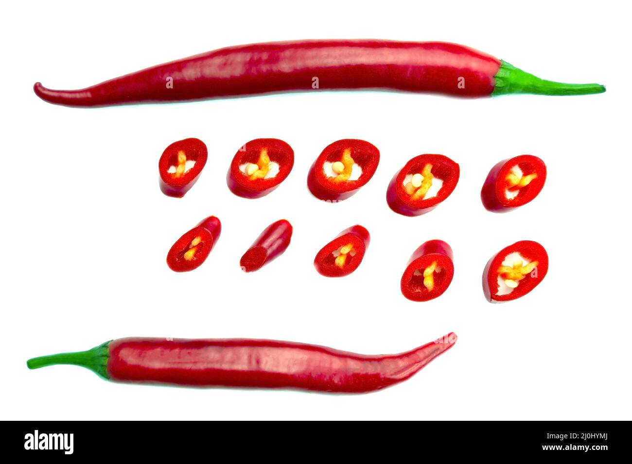 Red hot chopped chili peppers on white background. Top view Stock Photo ...