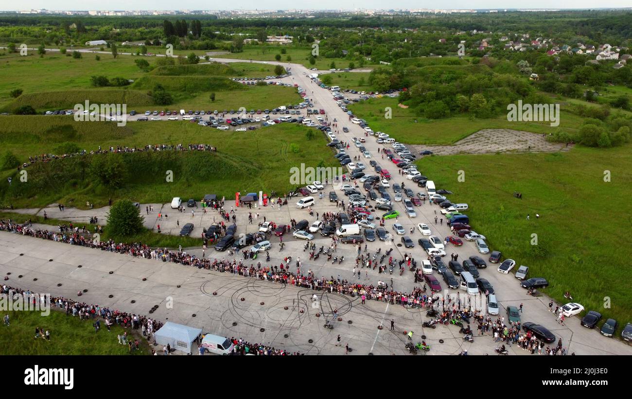 Drag recing. Car competition. Many people cars. Top view. Stock Photo