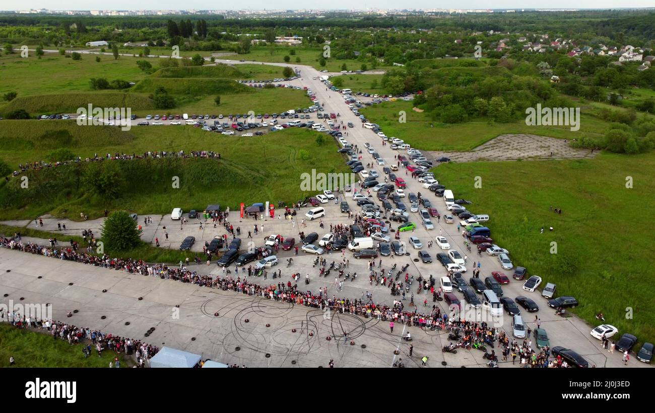 Drag recing. Car competition. Many people cars. Top view. Stock Photo