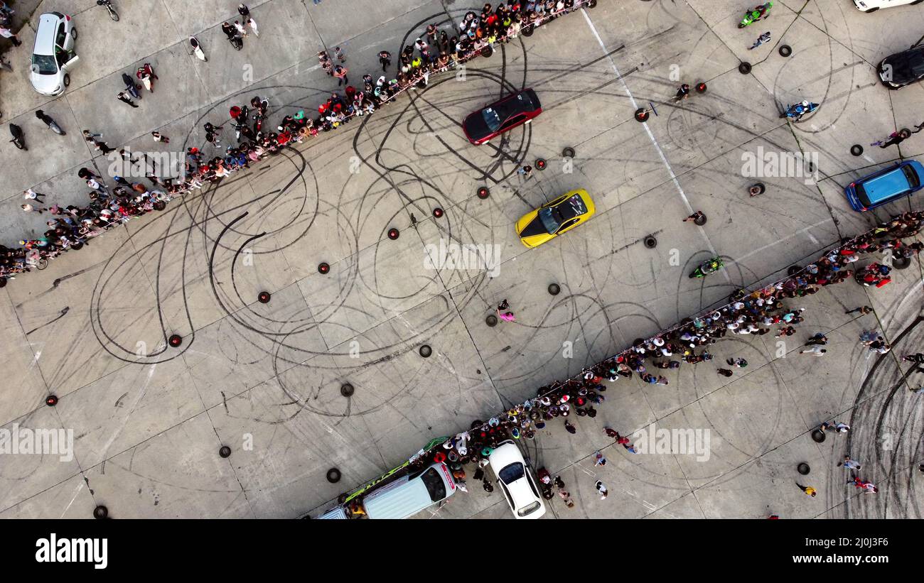Drag recing. Car competition. Many people cars. Top view. Stock Photo