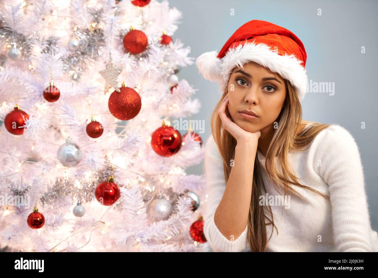 Sad woman on the tree hi-res stock photography and images - Alamy