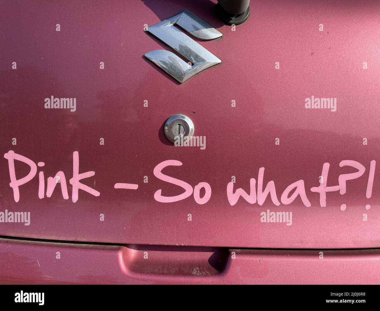 "pink so what?" text on a pink car Stock Photo Alamy
