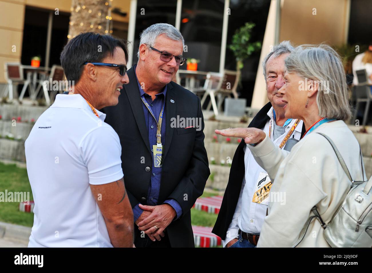 (L to R): Stuart Maloney, father of Zane Maloney (BRB) Trident F3 driver; Andrew Mallalieu (BAR) FIA Steward; Nick Mason (GBR) Pink Floyd Drummer and his wife Annette Lynton (GBR) Actress. Bahrain Grand Prix, Saturday 19th March 2022. Sakhir, Bahrain. Stock Photo