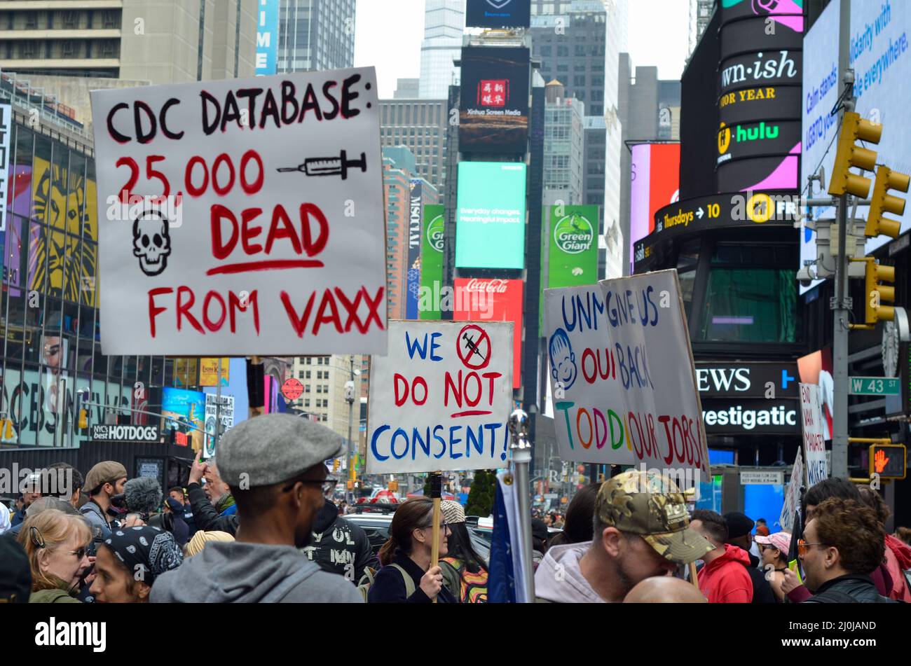 Demonstrators are seen holding anti vaccine banners demanding freedom to choose not to be vaccinated during the World Freedom Rally at Times Square in Stock Photo