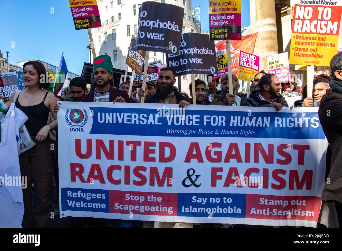 London, England, UK 19 March 2022 Protesters gather at Portland Place for the UN Anti Racism march to Parliament Square, in opposition to the Police, Crime, Sentencing and Courts Bill, Immigration Bill and to say that refugees are welcome Stock Photo