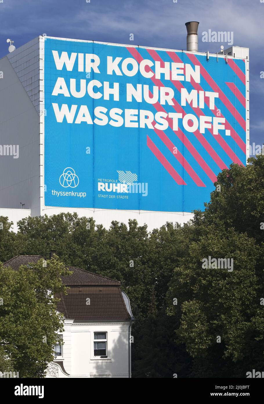 Large poster Klimastahl at the ThyssenKrupp Steel Europe plant, Bochum, Germany, Europe Stock Photo