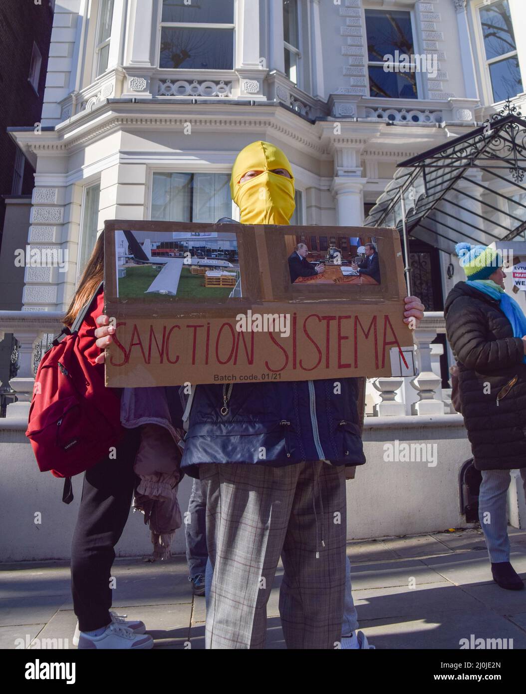 London, UK, 19th March 2022. Demonstrators gathered outside a mansion in  Holland Park owned by Russian oligarch Vladimir Yevtushenkov (aka  Evtushenkov), owner of Kronshtadt, part of Sistema Group, which the  protesters say