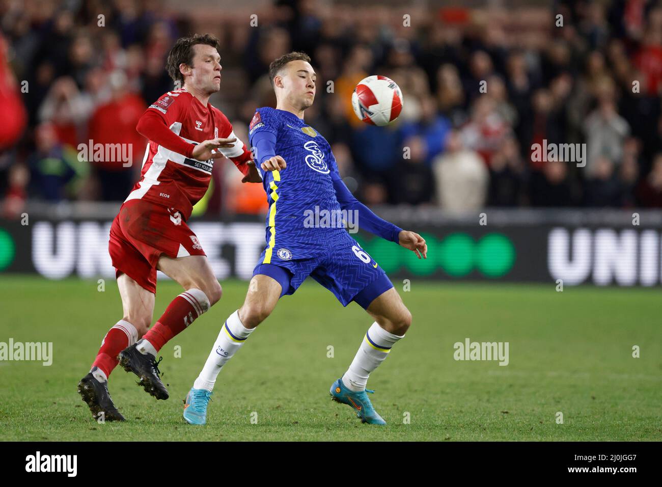 Middlesbrough's Jonny Howson and Chelsea's Harvey Vale (right) battle for the ball during the Emirates FA Cup quarter final match at the Riverside Stadium, Middlesbrough. Picture date: Saturday March 19, 2022. Stock Photo
