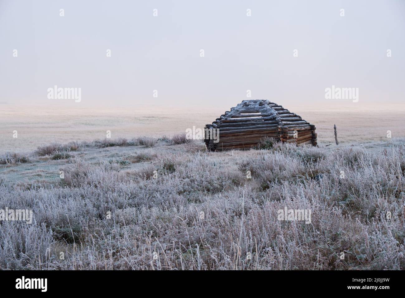 Altai shepherd's house ail and lake Dzhangyskol on mountain plateau Eshtykel. Altai, Russia Stock Photo