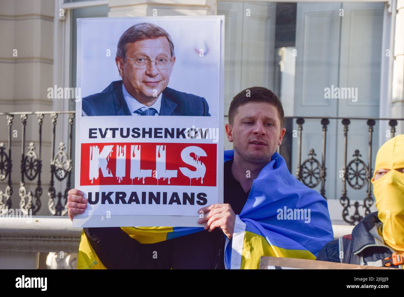 London, UK, 19th March 2022. Demonstrators gathered outside a mansion in  Holland Park owned by Russian oligarch Vladimir Yevtushenkov (aka  Evtushenkov), owner of Kronshtadt, part of Sistema Group, which the  protesters say