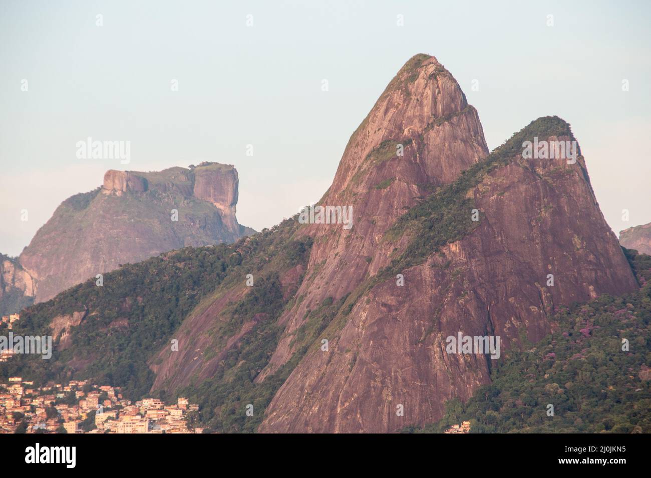 Two hill brother and gavea stone seen from ipanema beach in rio de janeiro, Brazil. Stock Photo