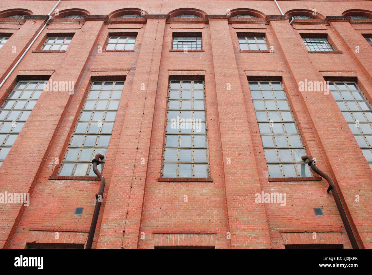 Facade of an old factory building. Stock Photo