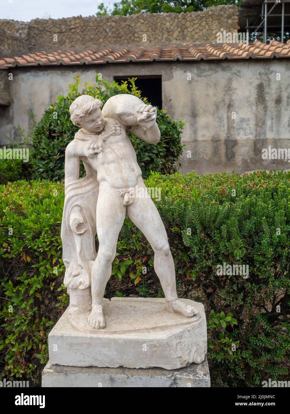 Statue of satyr with wineskin at Casa dei Cervi, Ercolano Stock Photo ...