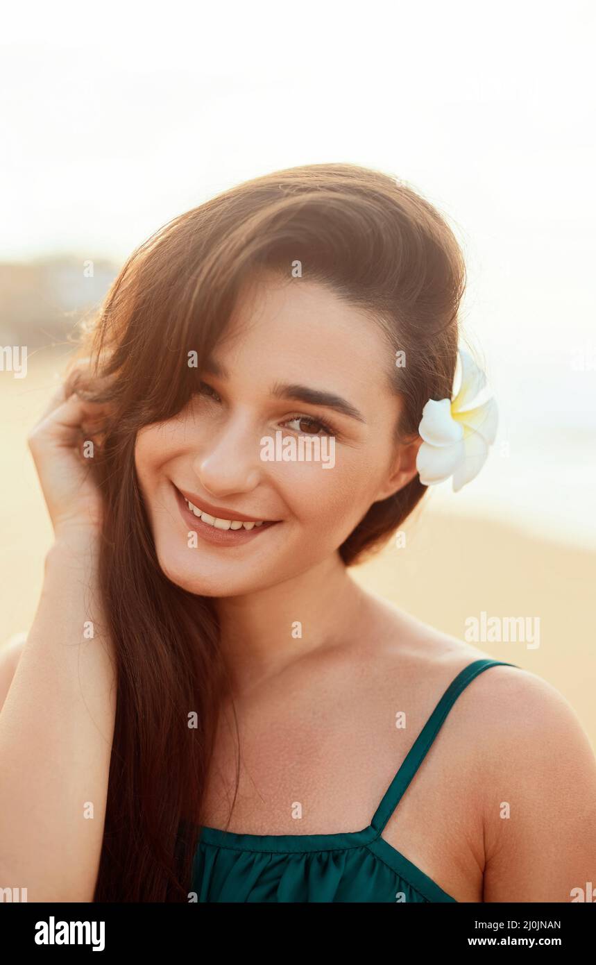 Woman with beauty face touching skin . Beautiful smiling girl model Young smiling woman  portrait. Stock Photo
