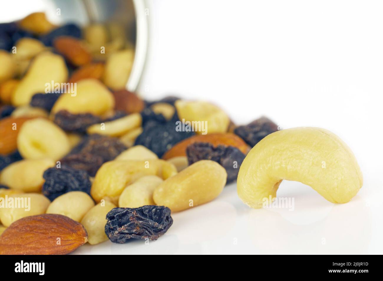 A can with spilled trail mix Stock Photo