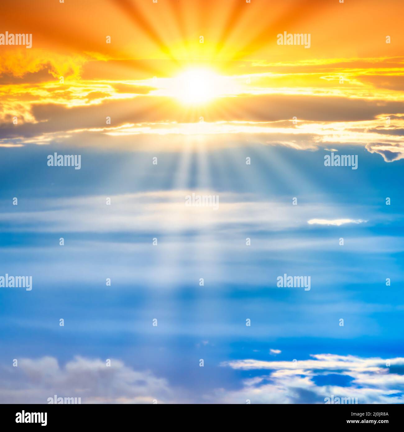 Sunset sky with sun rays Stock Photo