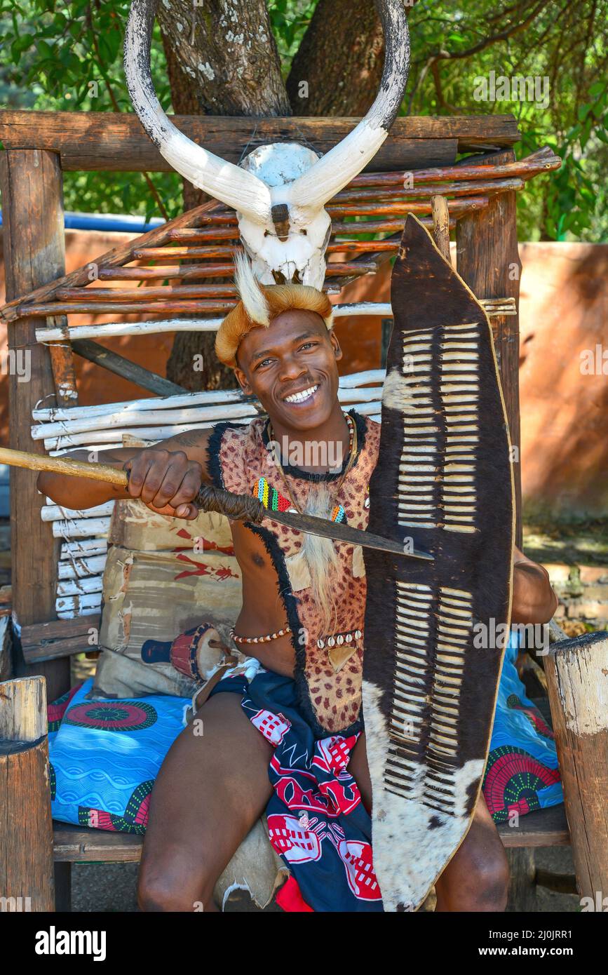 Zulu tribesman at Motseng Cultural Village, Sun City Resort, Pilanesberg, North West Province, Republic of South Africa Stock Photo