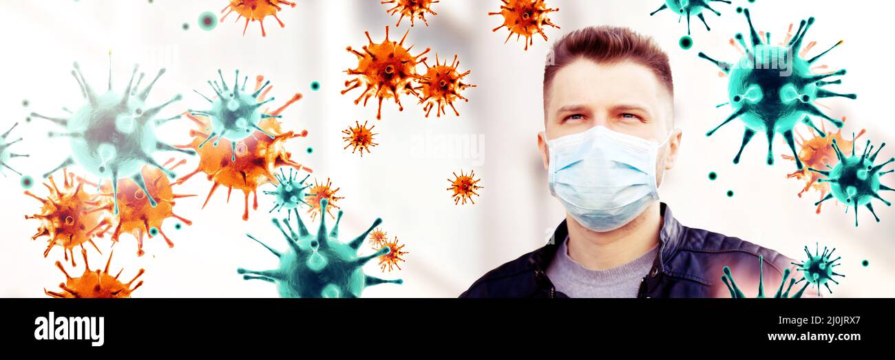 Young man in sterile face mask against corona virus. Stock Photo
