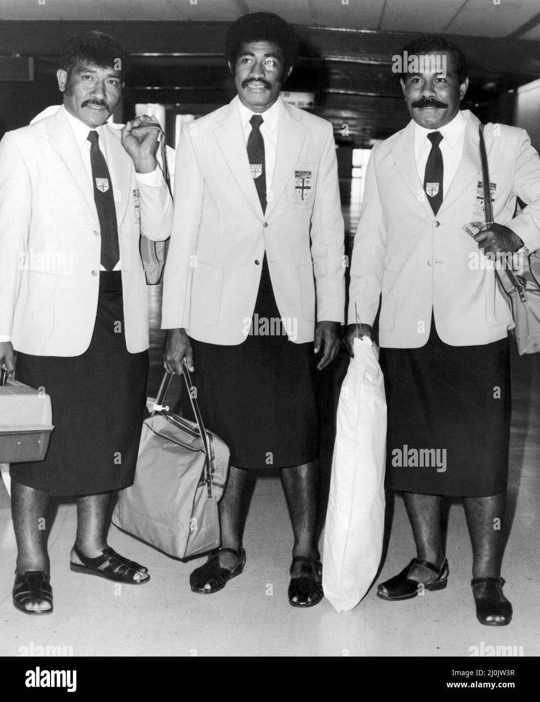 Fiji's cricket team arriving at Heathrow for the ICC Trophy tournament wearing traditional national dress, the sulu.7th June 1982. Stock Photo