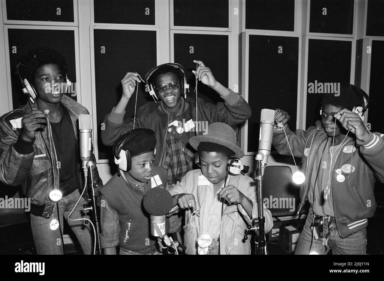 Musical Youth, British Jamaican pop / reggae group, at Capital Radio studios in London where they are helping to launch a road safety campaign involving glitter discs 8th October 1982. Members of the group are: Freddie Waite a.k.a. Junior, Dennis Seaton, Patrick Waite, Michael Grant & Kelvin Grant Stock Photo
